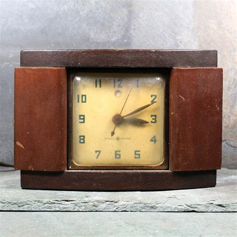 antique general electric box shaped brown clock|vintage General Electric mantel clock.